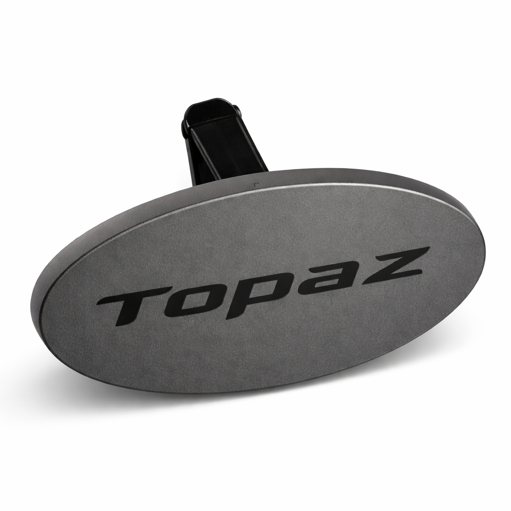 Topaz Oval Clip car air freshener with Dessert Noir scent — front view