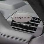 Topaz Oval Clip air freshener clipped on a car vent