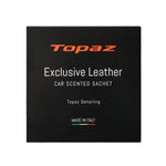 Topaz Exclusive Leather scent sachet in a car interior